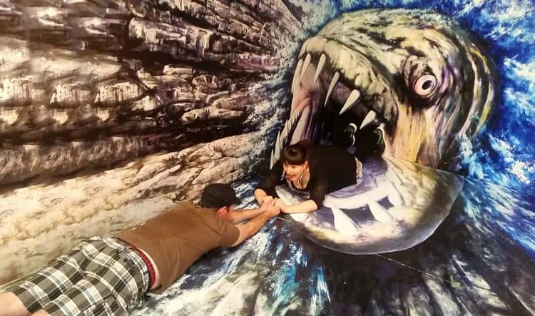 Save Someone Attacked By Big Fish Pose at Trick Eye Museum