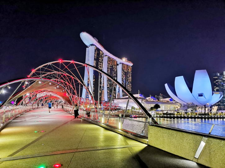 Helix Bridge illuminated at night, a marvel of architecture and lighting