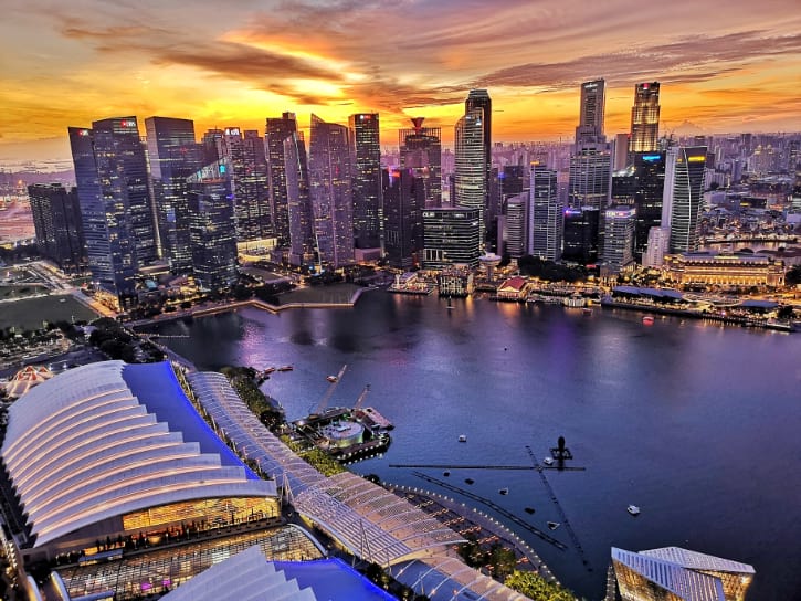 Evening view from Sands SkyPark, revealing a city's glittering skyline