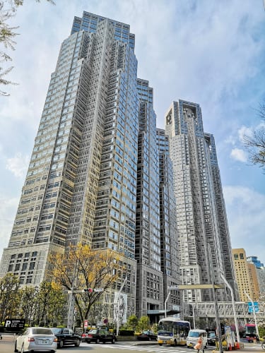 Tokyo Metropolitan Government Building with twin towers against the skyline in Shinjuku