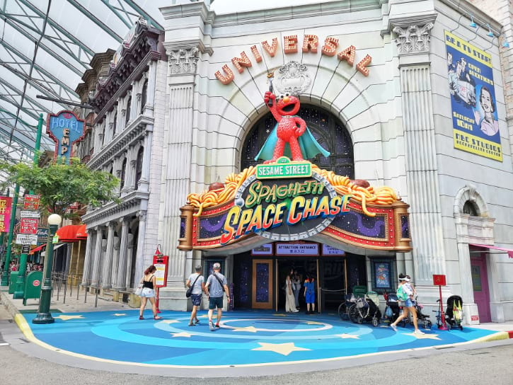 Colorful Sesame Street ride entrance with space theme