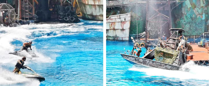 Performers execute high-speed jet ski maneuvers and pilot a battle-scarred boat at the WaterWorld stunt show