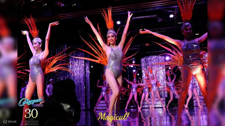 Dynamic stage scene from Calypso Cabaret Show in Bangkok, showcasing dazzling costumes and vibrant performances