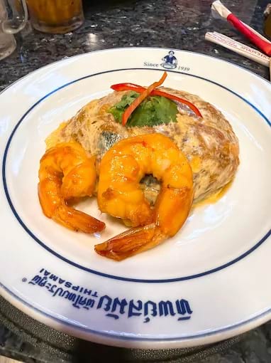 Padthai with shrimp oil, fresh deep-sea prawns, and wrapped with egg