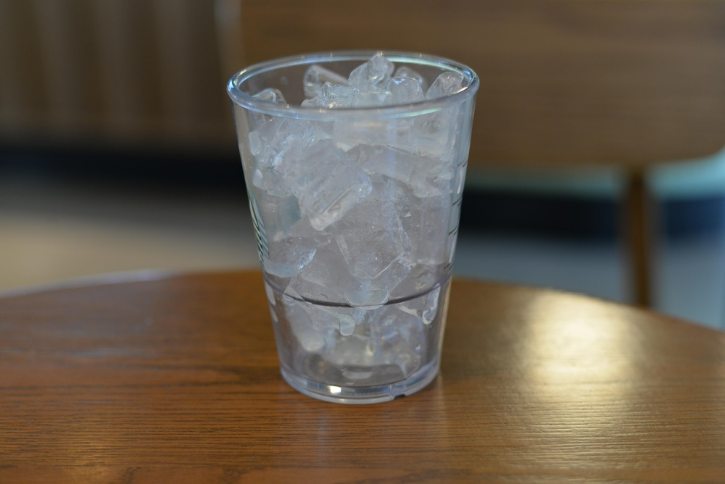 Glass Of Ice Cubes On A Table
