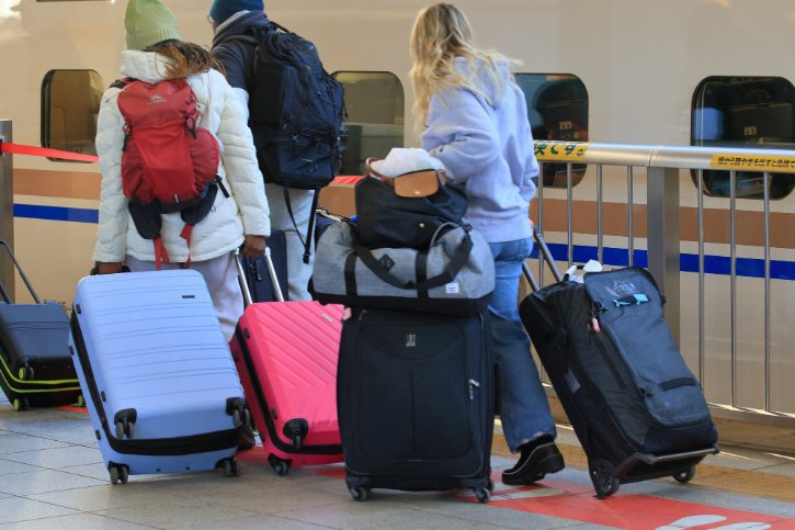 Travelers With Luggage On Shinkansen