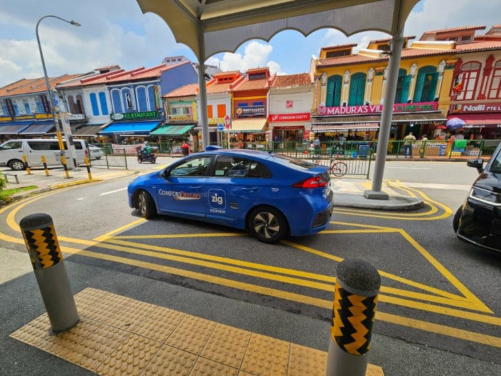 Little India Street With Taxi